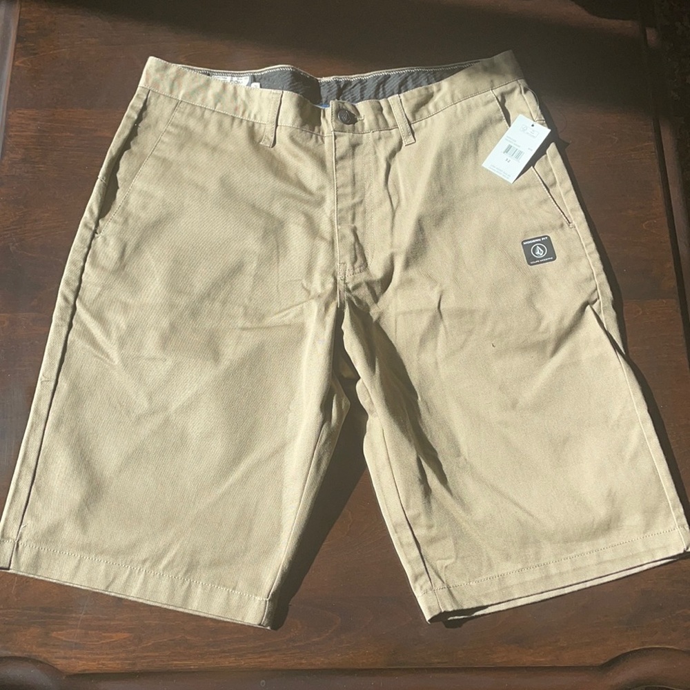 Volcom modern fit tan shorts.